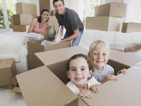 Secure household storage space in Croydon with stacked boxes and furniture