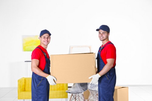 Team member using PPE while handling stored items