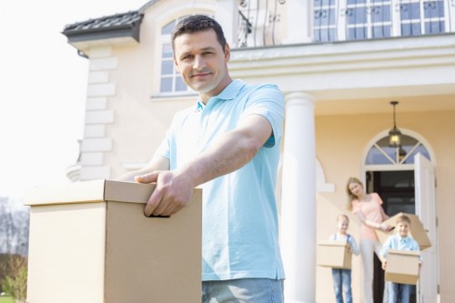Professional movers handling compact furniture transport in Croydon