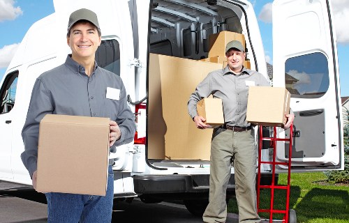 Furniture being carried during a local Croydon removal