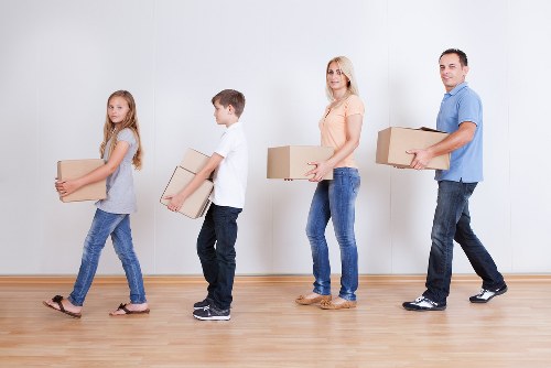 Removal team loading boxes for a Croydon home move