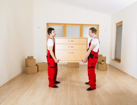 Staff assessing a self storage complaint with records and notes